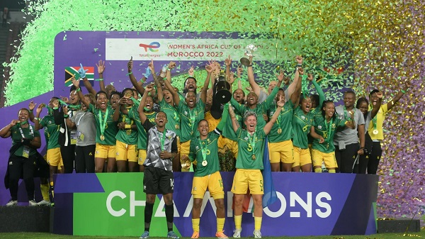 Players and officials of Banyana Banyana on cloud nine after winning thheir maiden WAFCON trophy